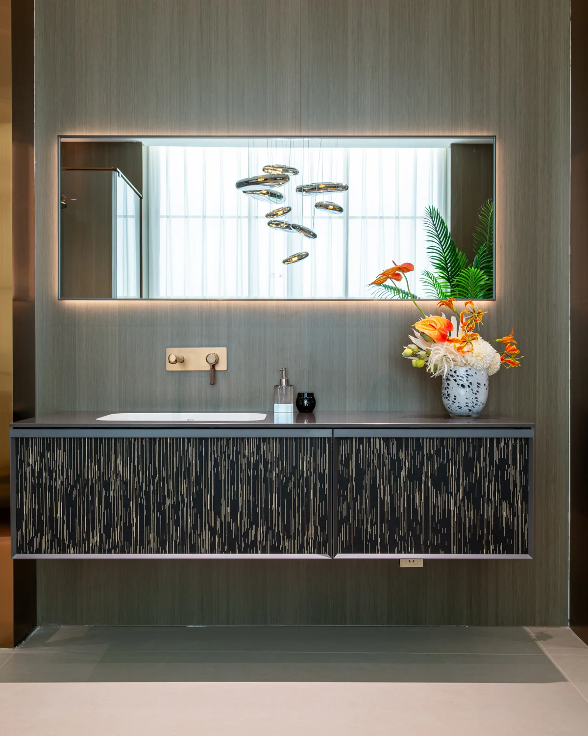 Bathroom vanity with integrated brass faucet