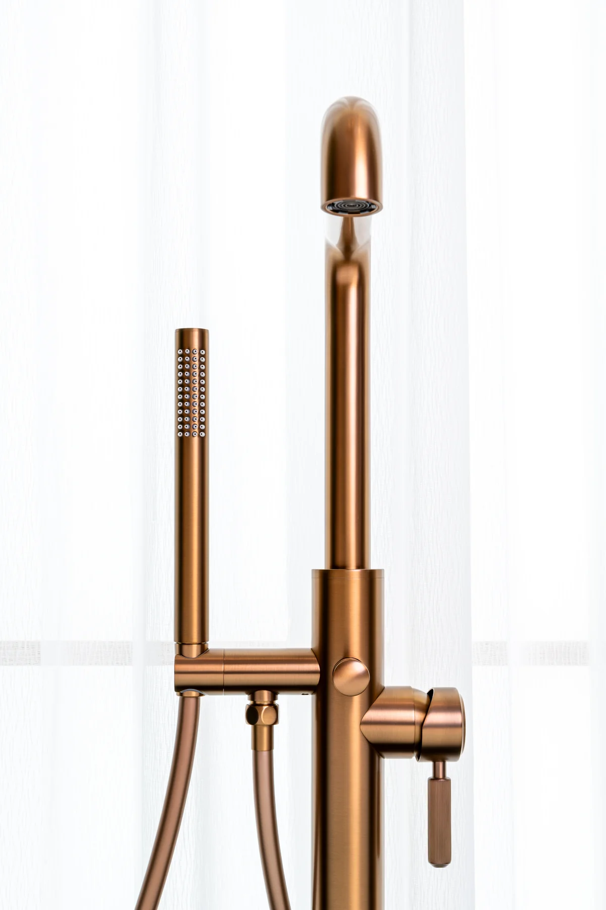 Brushed rose gold floor-standing tub filler