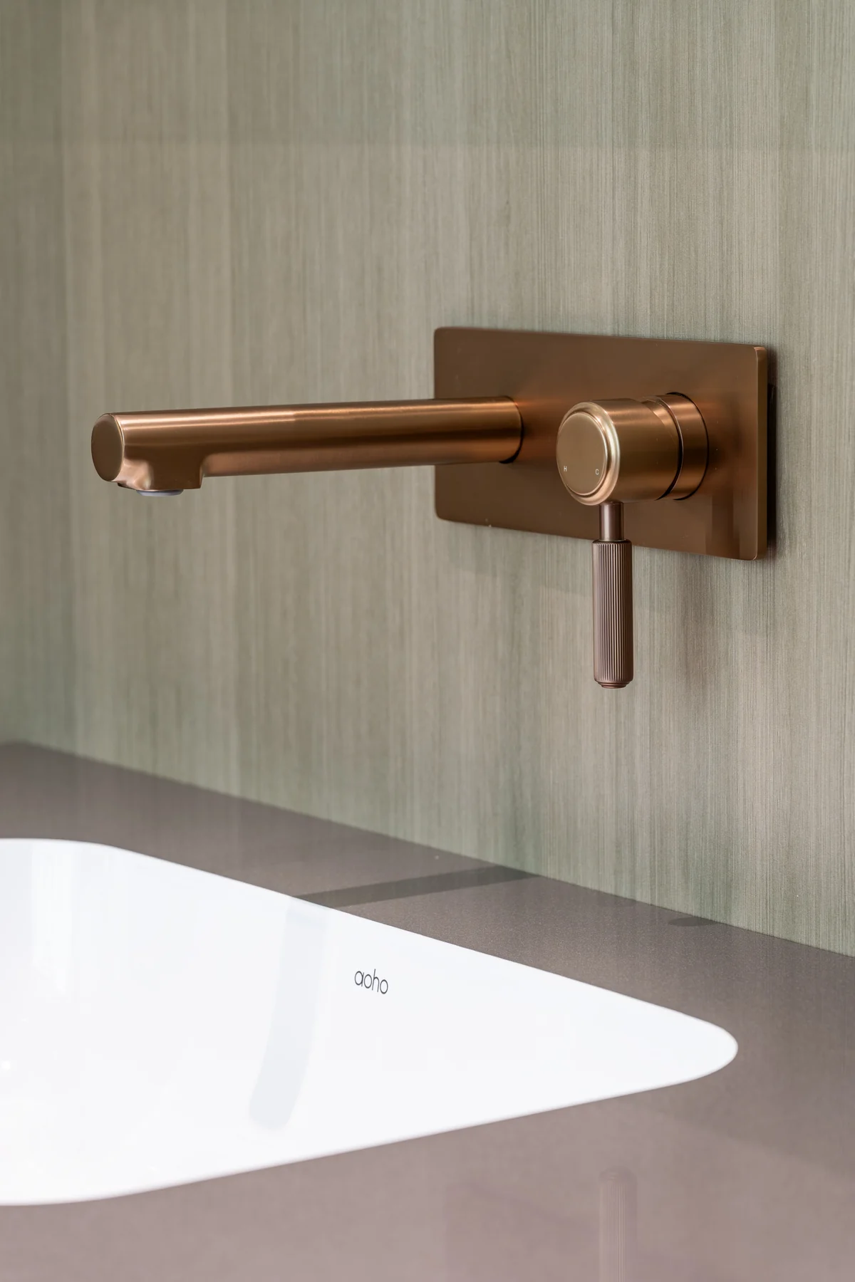 Brushed rose gold wall-mounted faucet