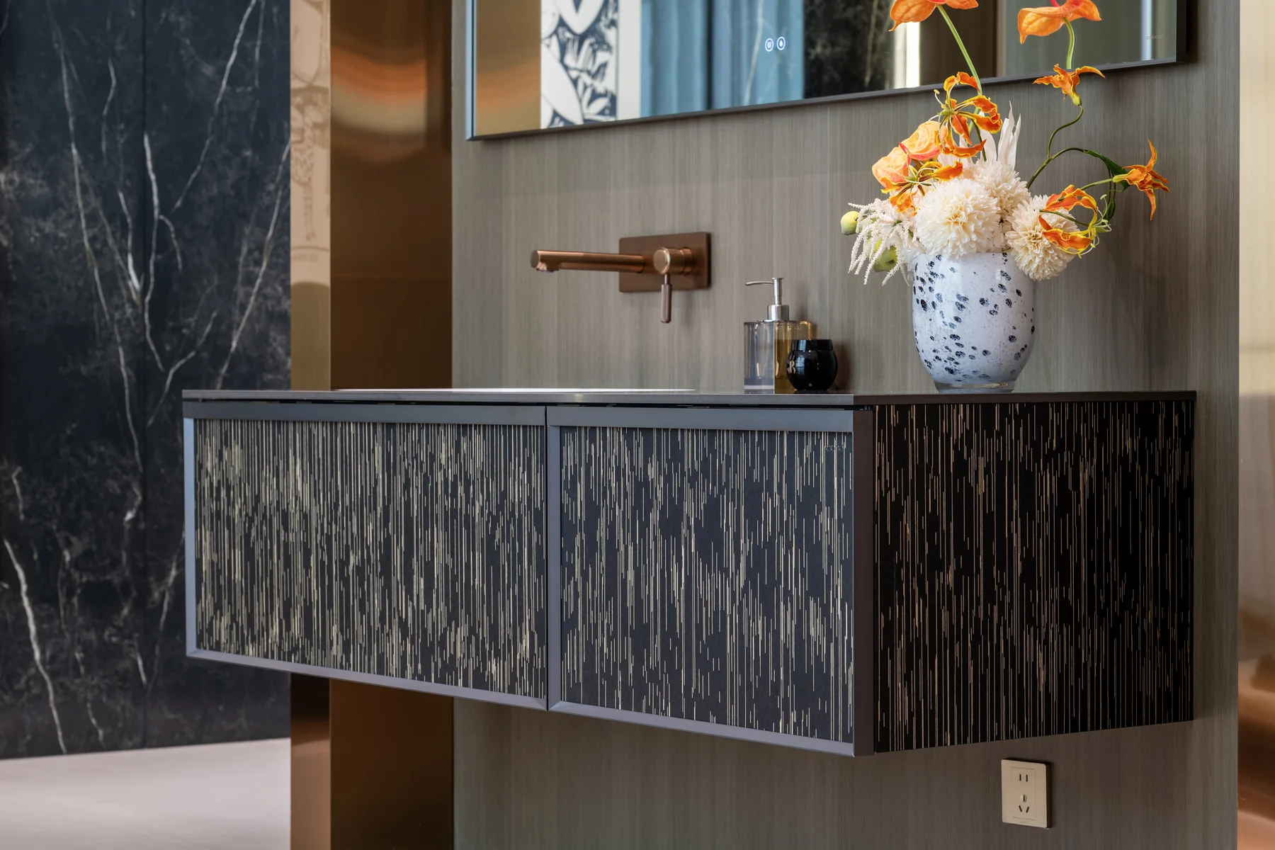 Wall-mounted vanity with textured facade